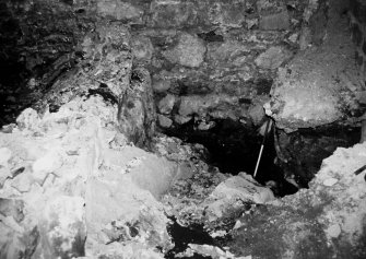 Excavation photograph: area X/H - trench location showing depth of deposit and bedrock.