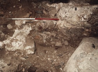 Excavation photograph : detail of wall 1066 of storekeeper's house.