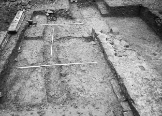Dunfermline, Priory Lane, former Lauder Technical College, excavations.
Excavation photograph : trench 1 - precinct wall and excavated drains.