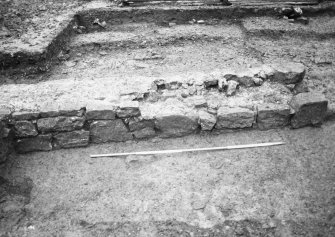 Dunfermline, Priory Lane, former Lauder Technical College, excavations.
Excavation photograph : trench 1 - precinct wall F108.