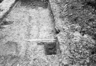 Dunfermline, Priory Lane, former Lauder Technical College, excavations.
Excavation photograph : trench 1 - west end of trench 1b showing part of ditch F131 and excavated drain F113.