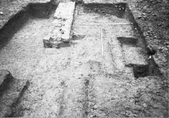 Dunfermline, Priory Lane, former Lauder Technical College, excavations.
Excavation photograph : trench 1 - precinct wall F108 and sections across east side of ditch F131
