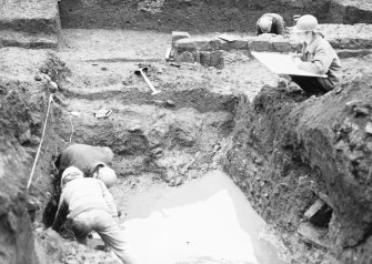 Dunfermline, Priory Lane, former Lauder Technical College, excavations.
Excavation photograph : trench 1 - excavation at bottom of ditch F131 in waterlogged conditions.