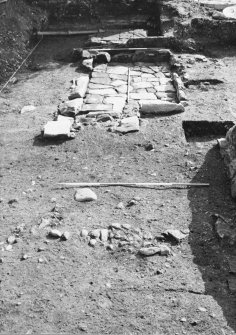 Dunfermline, Priory Lane, former Lauder Technical College, excavations.
Excavation photograph: trench 19 - showing rooms 1 and 2, sections across robber trench F188 and linear feature F190.