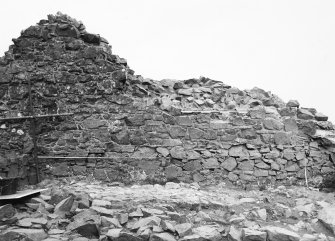 Excavation photograph - E face of W barmkin wall in Room III