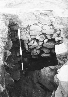Excavation photograph - lower courses of barmkin wall in Room I