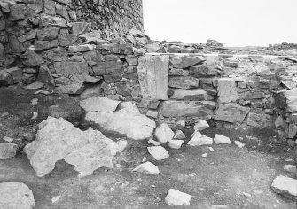 Excavation photograph - N face of wall 1 in Room II showing blocking 23 in situ