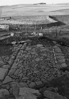 Excavation photograph : trench A - flagged floor of barmkin.