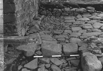 Excavation photograph : trench C - threshold in south-east corner.