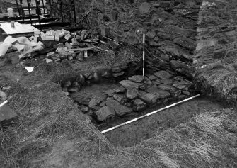 Excavation photograph : trench D - wall F25.