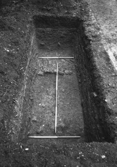 Trench 3 showing metalling at W end  - from E
