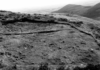 Excavation photograph : area VII - at level of f705, looking south.