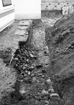 Excavation photgraph : modern soakaway and soil pipe.