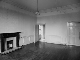 Interior view of Carlyle House, Haddington, showing room with fireplace.