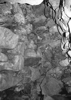 Stair-foot guard cell looking up.