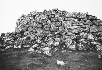 Outer wall below the East side.