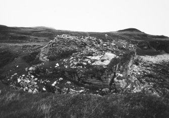 View towards large mural cell and cliff.