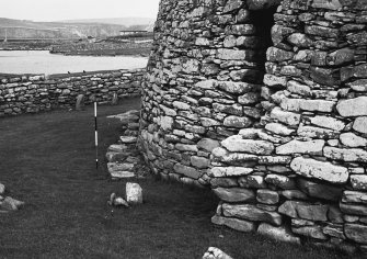 Outer wall of broch with 'spur' and foundations beyond