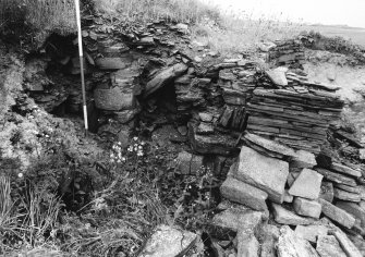 Partly exposed entrance from interior. Pole at door check. Radial pier.