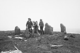 General view of the chambered cairn on Swona. Audrey Henshall (centre), J L Davidson (left) and D Frazer.