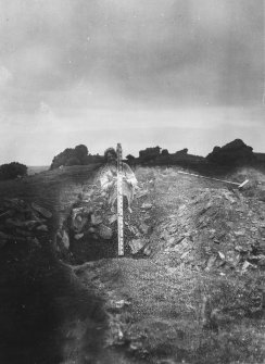 Excavation photograph showing base of B, section IV