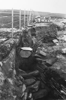 Excavation Photograph: End of passage C and intrusive cist. pl.xx.1.