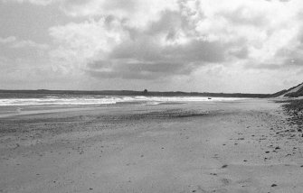 View S along Ackergill Links beach to Ackergill Tower in the distance.