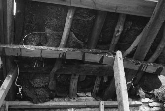 Interior.
View of byre roof structure.