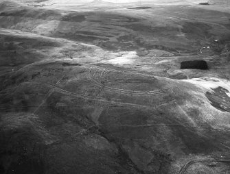 Woden Law, native fort and Roman investing works: air photograph.
Harding 79/010/5a, flown 1979.

