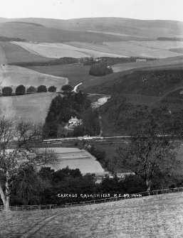 Copy of historic photograph showing distant general view from SE.
