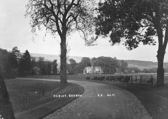 Copy of historic photograph showing distant general view.