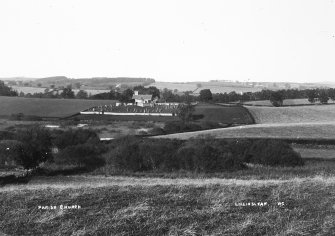 Copy of historic photograph showing distant view from SE.