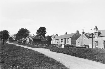 Copy of historic photograph showing general view.