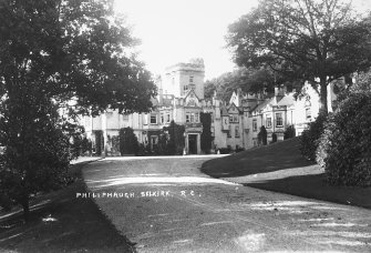 Copy of historic photograph showing view from SE.