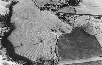 Wardhouse, Home Farm, hut-circles, enclosures and rig: aerial view.