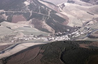 Oblique aerial view centred on village from SW.