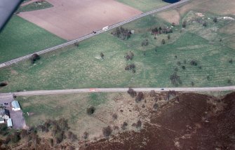 An oblique aerial view of Chapleton, Boat of Garten, Duthil and Rothiemurchus, Badenoch and Strathspey, looking N.