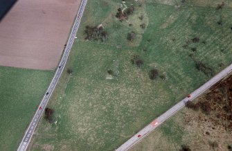 An oblique aerial view of Chapleton, Boat of Garten, Duthil and Rothiemurchus, Badenoch and Strathspey, looking NE.