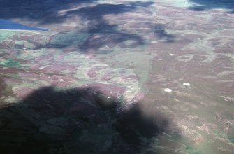 Aerial view of Garrywhin Fort and Cairn o'Get Chambered Cairn, Ulbster, Caithness, looking NNW.