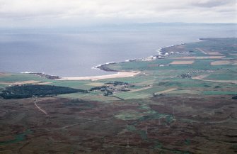 An oblique aerial view of Brackside, New Reay, Caithness, looking NE.