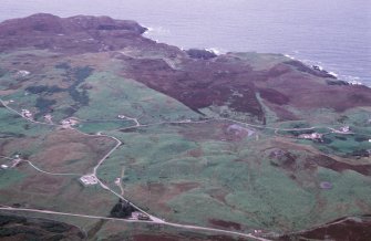 An oblique aerial view of Fiscary, Farr, Sutherland, looking NNW.