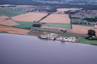 Aerial view of Sewage Treatment Plant at Allanfearn, NE of Inverness, looking ESE.