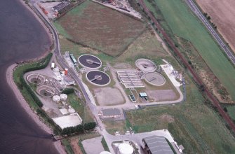 Aerial view of Sewage Treatment Plant at Allanfearn, NE of Inverness, looking NE.