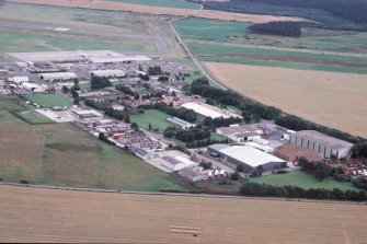 Aerial view of Dalcross Industrial estate, E of Inverness, looking N.