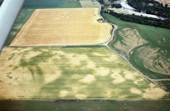 An oblique aerial view of Kinchyle, Croy and Dalcross, Nairn, looking ENE.