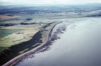 An oblique aerial view of Old Petty, Petty, Inverness, looking SW.