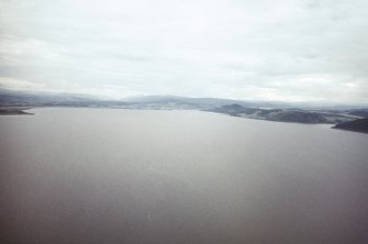 An oblique aerial view of the Moray Firth, looking SW.