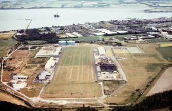 An oblique aerial view of Invergordon, Ross and Cromarty, looking S.