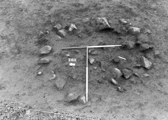 Castle of Wardhouse excavation archive
Frame 14: Area 1: Detail of possible pit 101 in SW part of the area - pre-excavation. From W.
