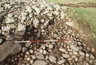 Excavation photograph : trench I - cairn from south-west.
